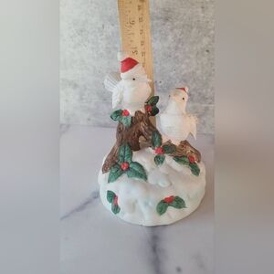 Vintage Royal Crown porcelain music box with two white doves on a snow-co